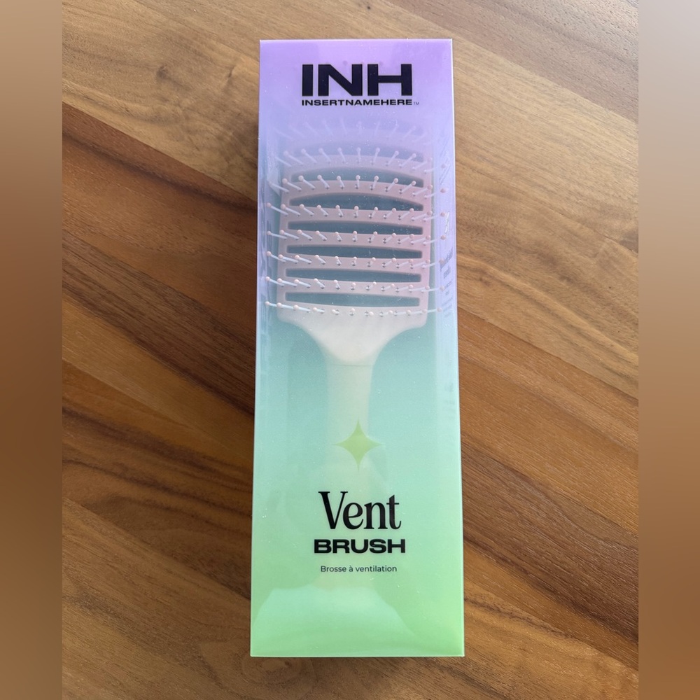 INH Curved Vent Brush. Great for quicker drying, smoothing and detangling hair.